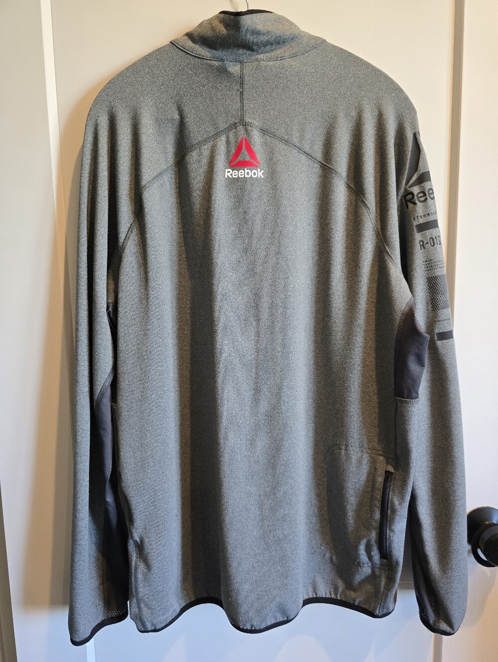 Reebok Men’s Gray Lightweight Performance Jacket with Red Logo